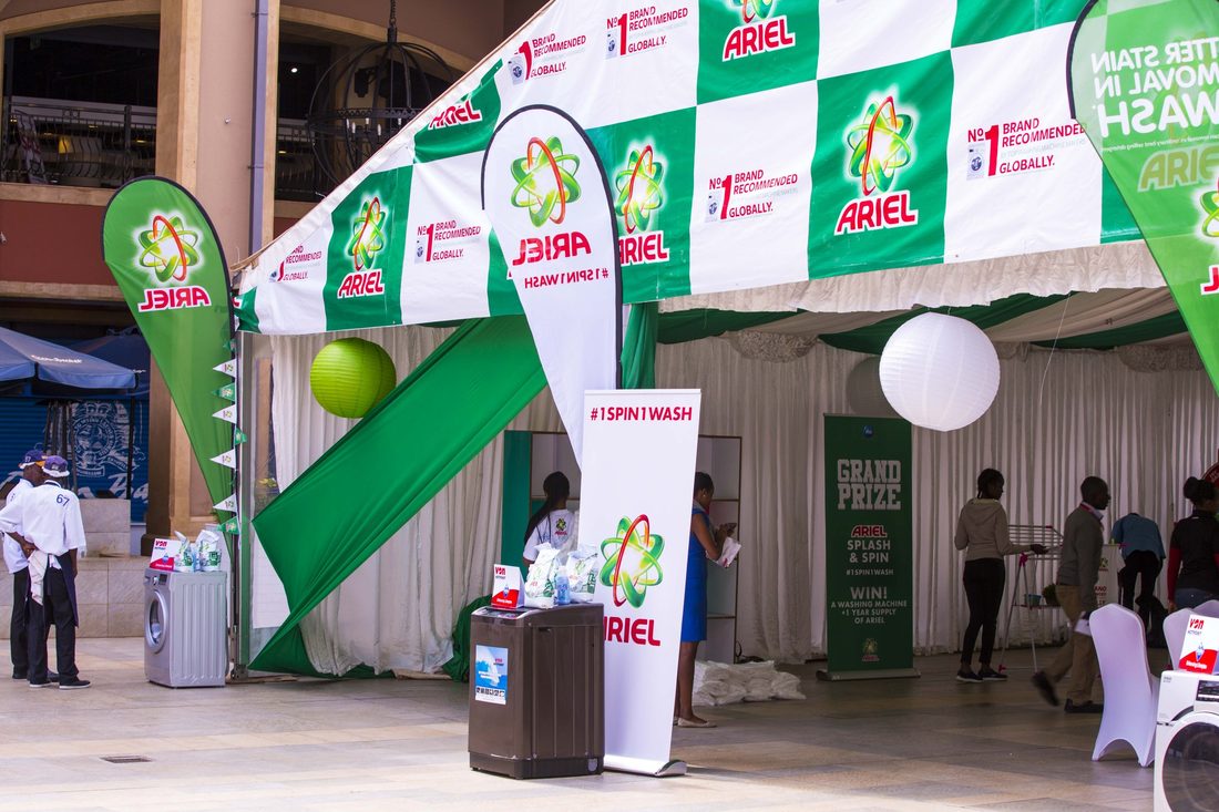 Guests walking through a branded entrance gateway